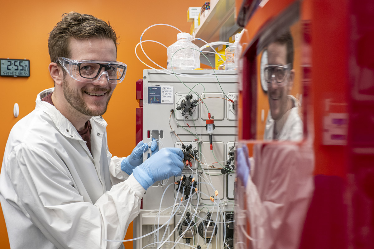Male scientist in lab with PPE